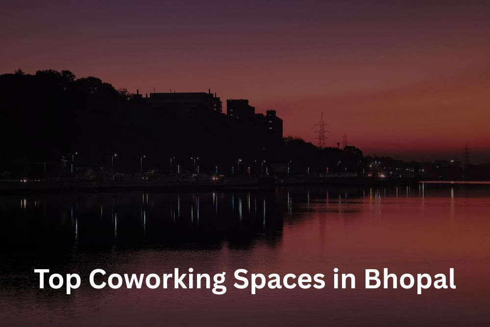 A silhouette of Bhopal's skyline at sunset over a lake, with text reading "Top Coworking Spaces in Bhopal."