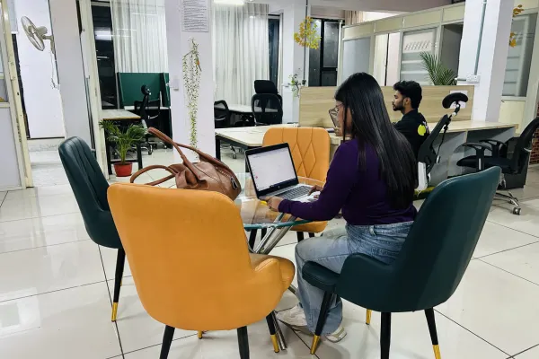 Professional working environment at coworking spaces in bhopal with flexible seating and modern office amenities.