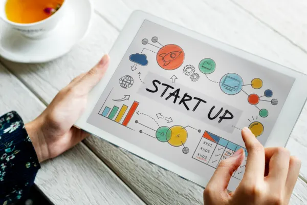 Startup planning session with digital business strategy, innovation ideas, growth planning, and creative collaboration tools.